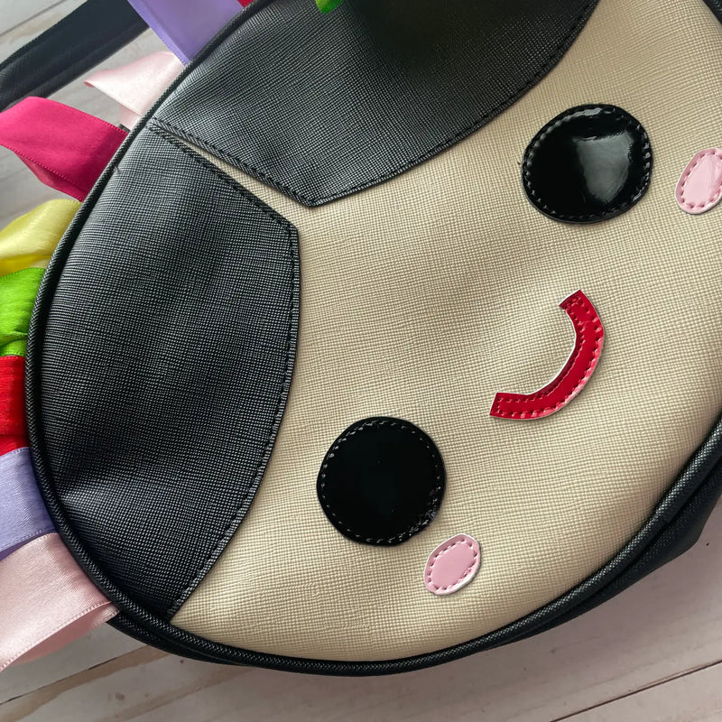 Mexican Doll Lele Kawaii Crossbody Faux Leather Purse at Sew Bonita in Corpus Christi, TX.