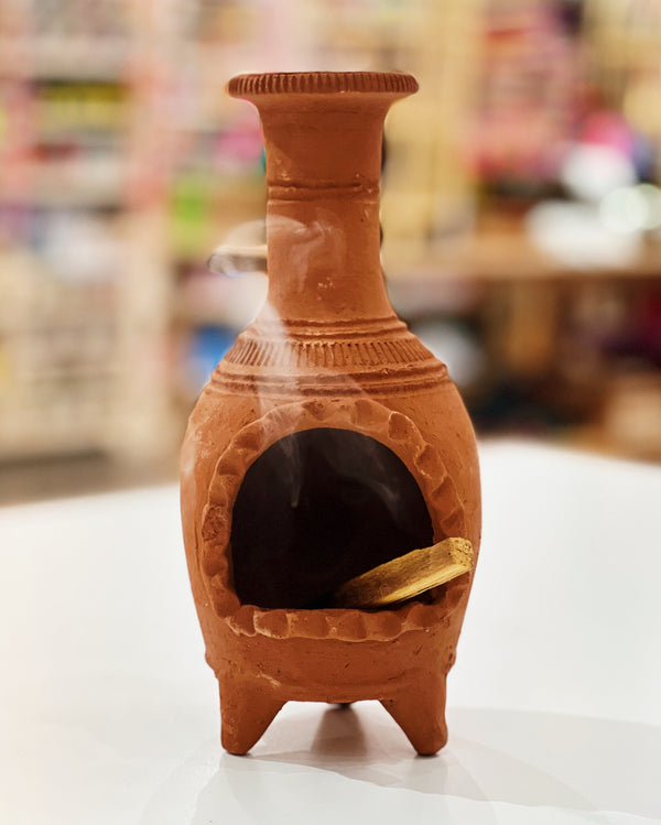 chimney from Sew Bonita in Barro with Palo Santo Stick inside