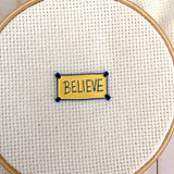 Inspirational "Believe" Poster Needle Minder