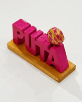 handmade wood pink "Puta" sign with concha on it from Sew Bonita 